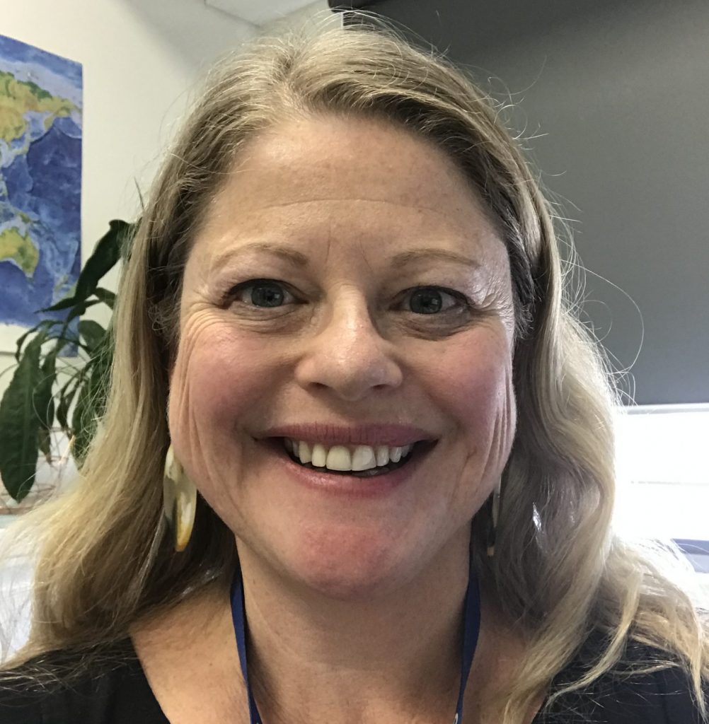 Photo of Dr Jane Frawley. She is smiling and has shoulder length blonde hair.